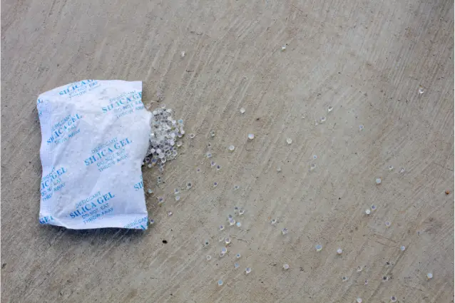Broken silica gel packet, some gel bubbles came out from the pack.